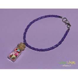 Pulsera de cordón lila con pastelitos