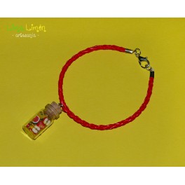 Pulsera de cordón rojo con frutas